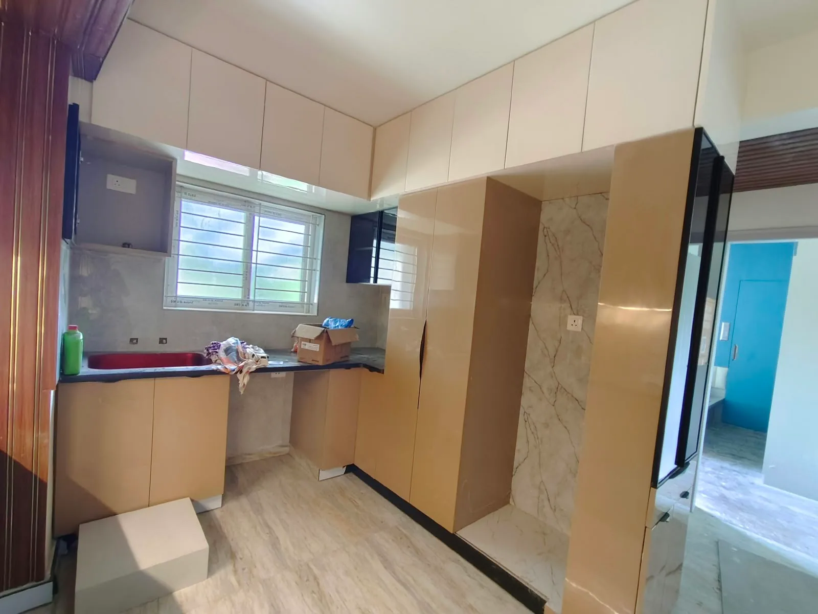 Avenza project work: Modular kitchen with tall pantry unit and ceiling-height lofts