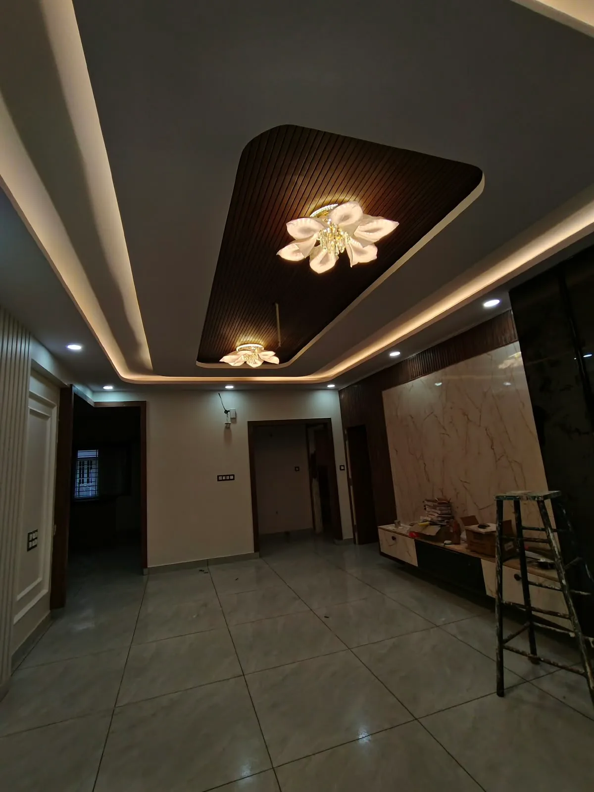 Avenza project work: Living room false ceiling cove illumination and feature wall
