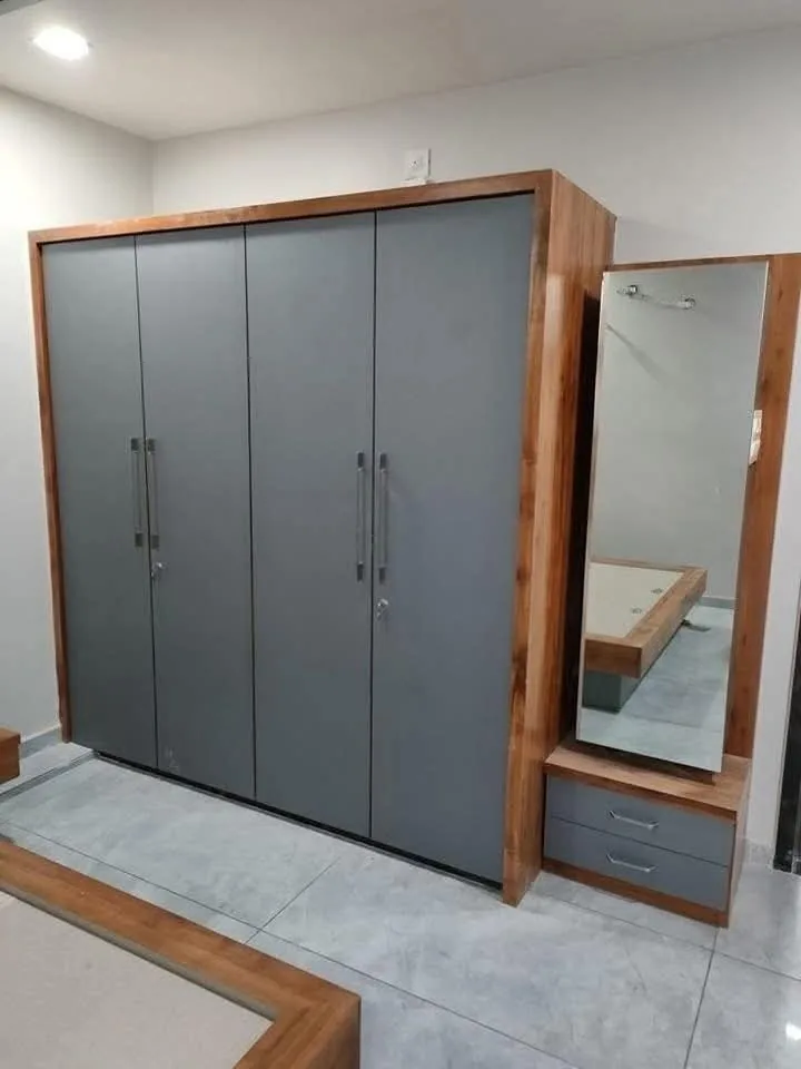 Avenza project work: Matte grey wardrobe with teak framing and vanity mirror